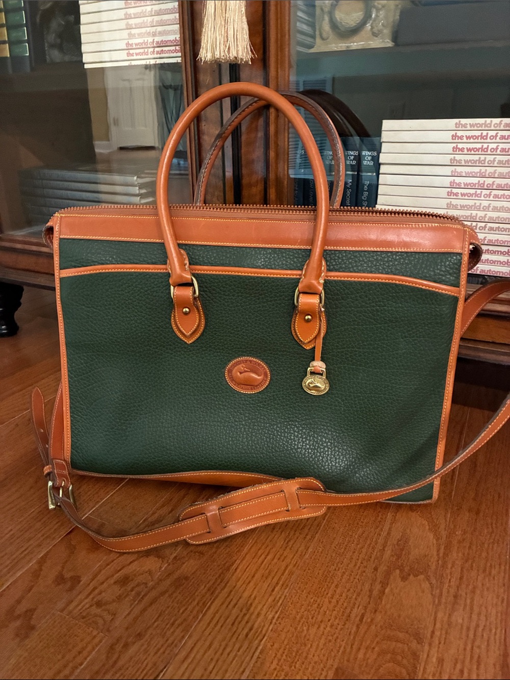 Dooney & Bourke Green Pebbled Leather Handbag with Tan Trim and Gold Hardware